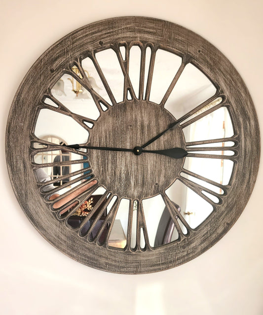 80cm wooden mirror wall clock hung on a plain wall