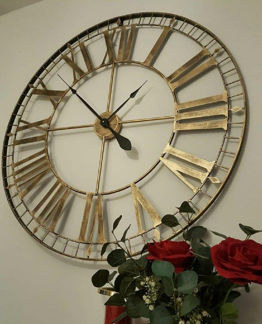88cm rustic gold skeleton wall clock, a popular choice above a fireplace